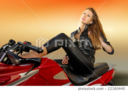 blonde girl on a motorcycle 22160440
