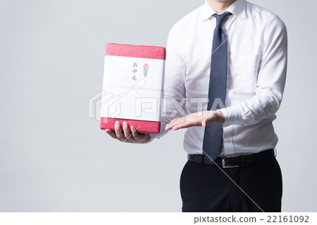 Businessman with gifts (white back) Businessman with gifts (white back) 22161092