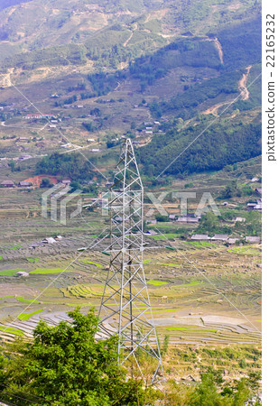 Electricity pylon in valley 22165232