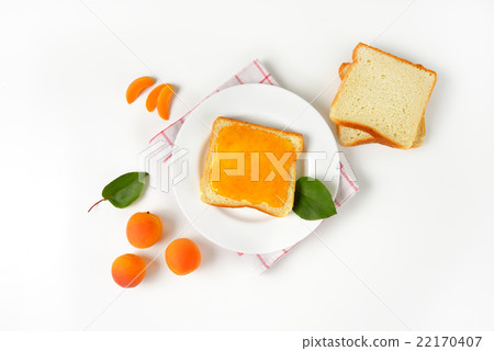 White bread with apricot jam White bread with apricot jam 22170407