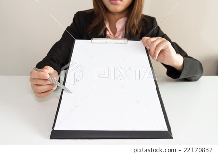 Businesswoman pointing the empty documents Businesswoman pointing the empty documents 22170832