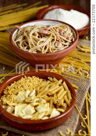 uncooked pasta, spaghetti alla carbonara, cheese uncooked pasta, spaghetti alla carbonara, cheese 22173708