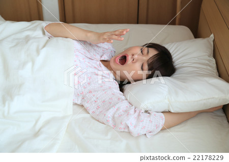 Women sleeping deeply in futon 22178229