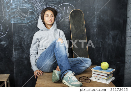 young cute teenage girl in classroom at blackboard young cute teenage girl in classroom at blackboard 22178625