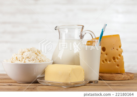 Milk jar on wooden table 22180164