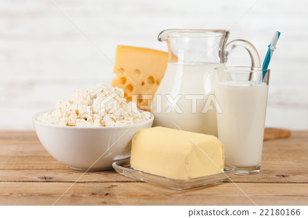 Milk jar on wooden table 22180166