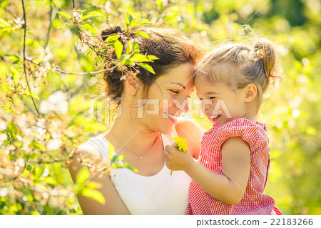 Mother and daughter in sunny park Mother and daughter in sunny park 22183266
