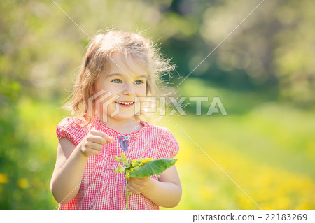 Happy little girl in spring sunny park Happy little girl in spring sunny park 22183269