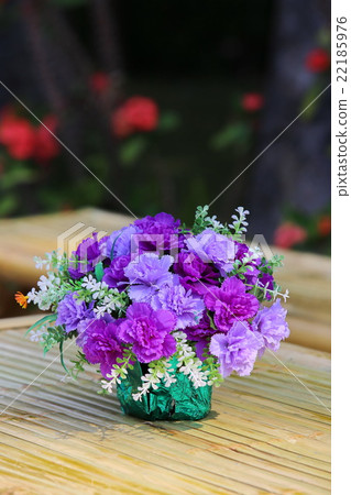 Beautiful  flower bouquet on wooden table 22185976