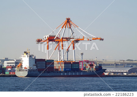 Cargo ship in cargo handling at container terminal Cargo ship in cargo handling at container terminal 22186223