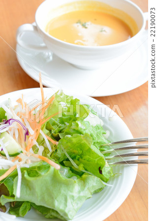 Delicious salad and soup 22190073