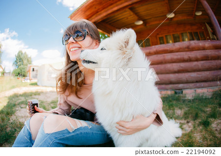 young woman girl white dog jeans young woman girl white dog jeans 22194092