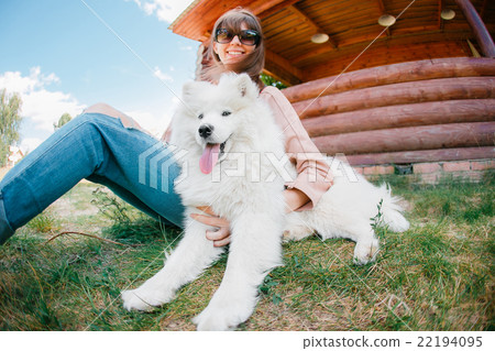 young woman girl white dog jeans young woman girl white dog jeans 22194095