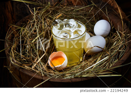 Whiskey Sour with ice cubes  22194249