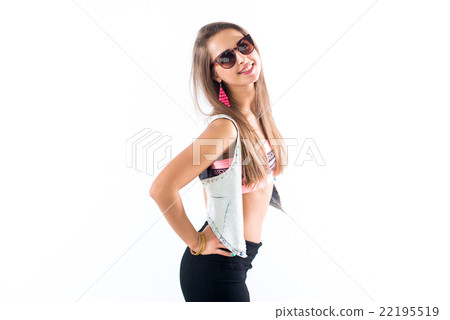 Young female model standing sideways, bending her Young female model standing sideways, bending her 22195519