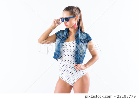 Happy beautiful girl presenting new hot summer Happy beautiful girl presenting new hot summer 22195779
