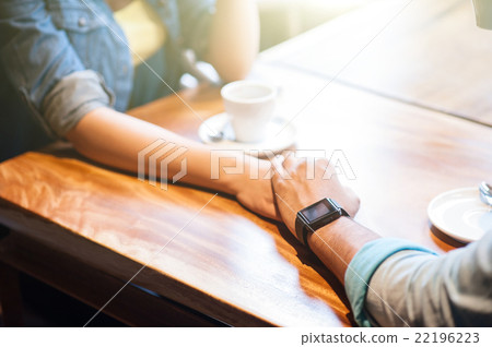 Cute man and woman are dating in restaurant 22196223