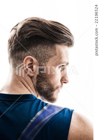 Skillful male athlete is showing his trained body 22196524