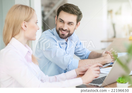 Skillful two colleagues are working in cooperation 22196630
