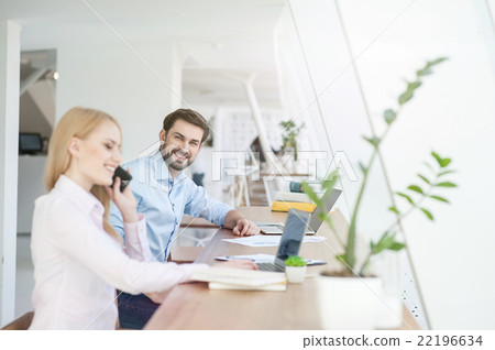 Attractive man and woman are working with joy Attractive man and woman are working with joy 22196634