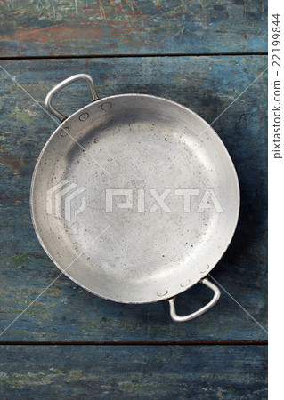 old empty cooking pot on rustic wooden background 22199844