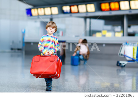 Little kid boy with suitcases on international Little kid boy with suitcases on international 22201063