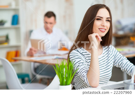Positive woman working in the office Positive woman working in the office 22207960