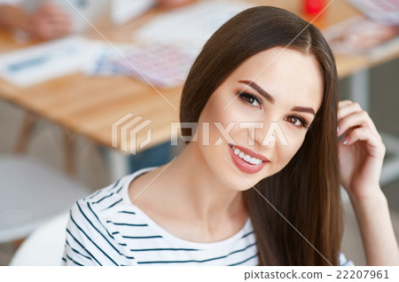 Positive woman working in the office Positive woman working in the office 22207961