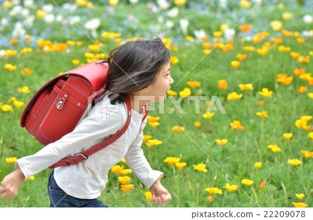 Girl running in flower garden (school bag) Girl running in flower garden (school bag) 22209078