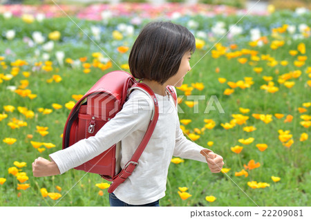 Girl running in flower garden (school bag) Girl running in flower garden (school bag) 22209081