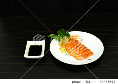 Fresh salmon sashimi and sauce isolated Fresh salmon sashimi and sauce isolated 22211653