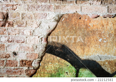 Dirty concrete wall with graffiti and big crack Dirty concrete wall with graffiti and big crack 22212581