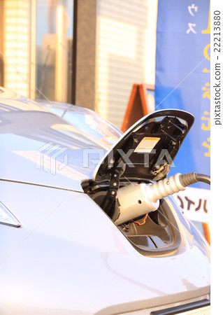 Electric car under charge 22213880