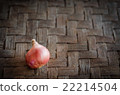 Shallots on mat with vignette background. 22214504