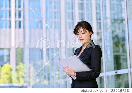Working woman office street suit with figure in hand c Working woman office street suit with figure in hand c 22216738