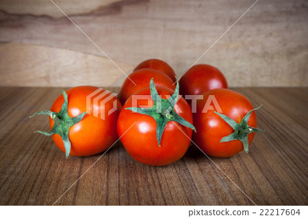Close-up fresh ripe tomatoes on wood background 22217604
