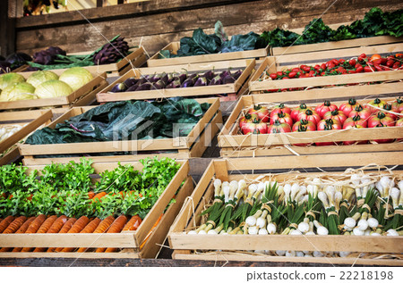 Various vegetables in wooden containers in the marketplace, heal 22218198