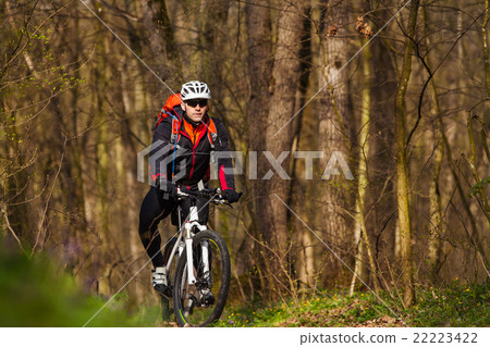 Mountain Bike cyclist riding single track 22223422