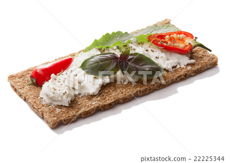 Bread crisp with pepper,soft cheese and basil Bread crisp with pepper,soft cheese and basil 22225344