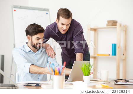 Skillful two colleagues have success in work Skillful two colleagues have success in work 22229214