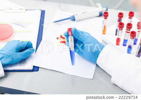 Skillful male researcher is working in laboratory 22229714