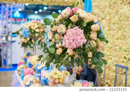 Wedding decoration of flowers on a festive table Wedding decoration of flowers on a festive table 22233335