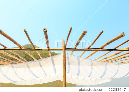 wooden with fabric roof on blue sky wooden with fabric roof on blue sky 22235647
