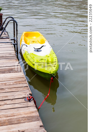 Kayak boat in big river Kayak boat in big river 22235649