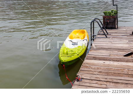 Kayak boat in big river Kayak boat in big river 22235650