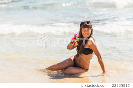 Beautiful Lady in a Swimsuit on the Sea.  22235915