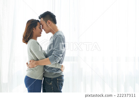 Hugging couple Hugging couple 22237311