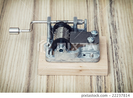 Old little music box on the wooden background, retro style 22237814