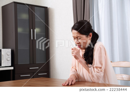 Women in their 50s coughing 22238444