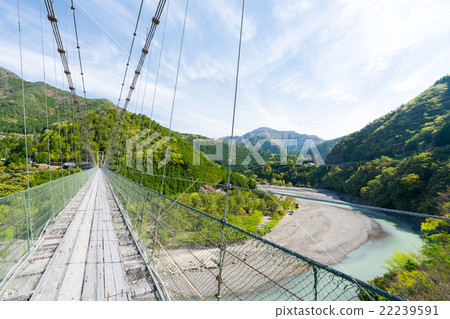 Suspension bridge in Tanase (landscape of Totsukawa village in Nara prefecture) Suspension bridge in Tanase (landscape of Totsukawa village in Nara prefecture) 22239591